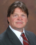 Dr. Charles A. Hughes